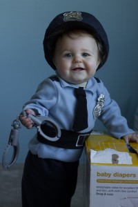 Elijah is a cute officer like his daddy! By Lauren P.